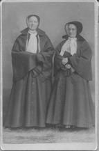 SA0008 - Anna Dodgson is on the left and Mary Hazard is on the right. Full length portraits. Caption on the back.